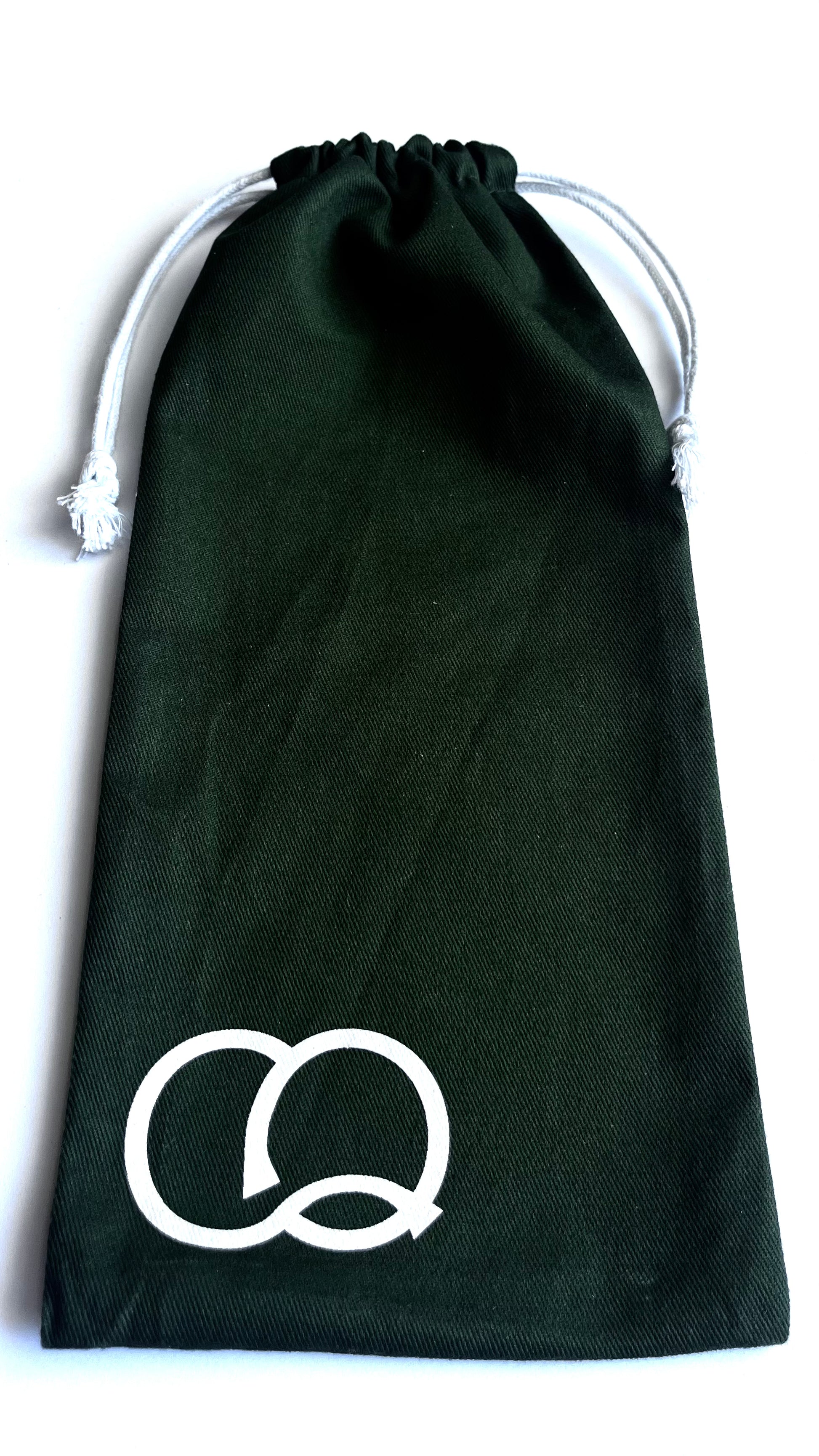 A vibrant green drawstring canvas carry bag featuring a collection of fashion stencils. The bag is made of durable fabric and has a drawstring closure at the top. Viewed from the front.