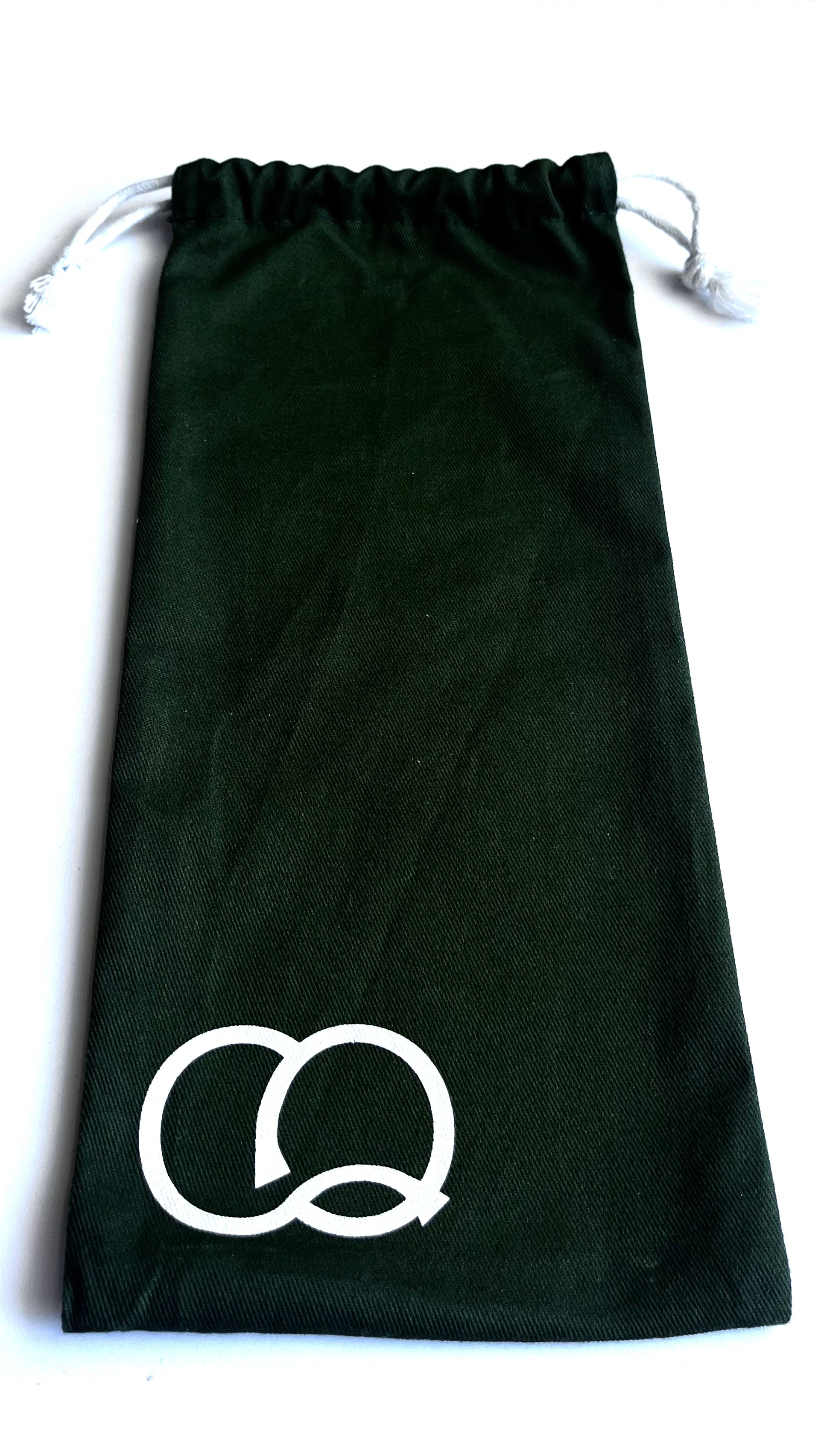 A vibrant green drawstring canvas carry bag featuring a collection of fashion stencils. The bag is made of durable fabric and has a drawstring closure at the top. Viewed from the front, open at the top.